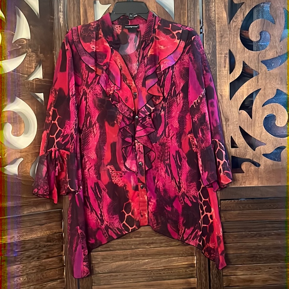 Moonlight Bay XL Fuchsia, black, and purple animal print ruffled blouse.